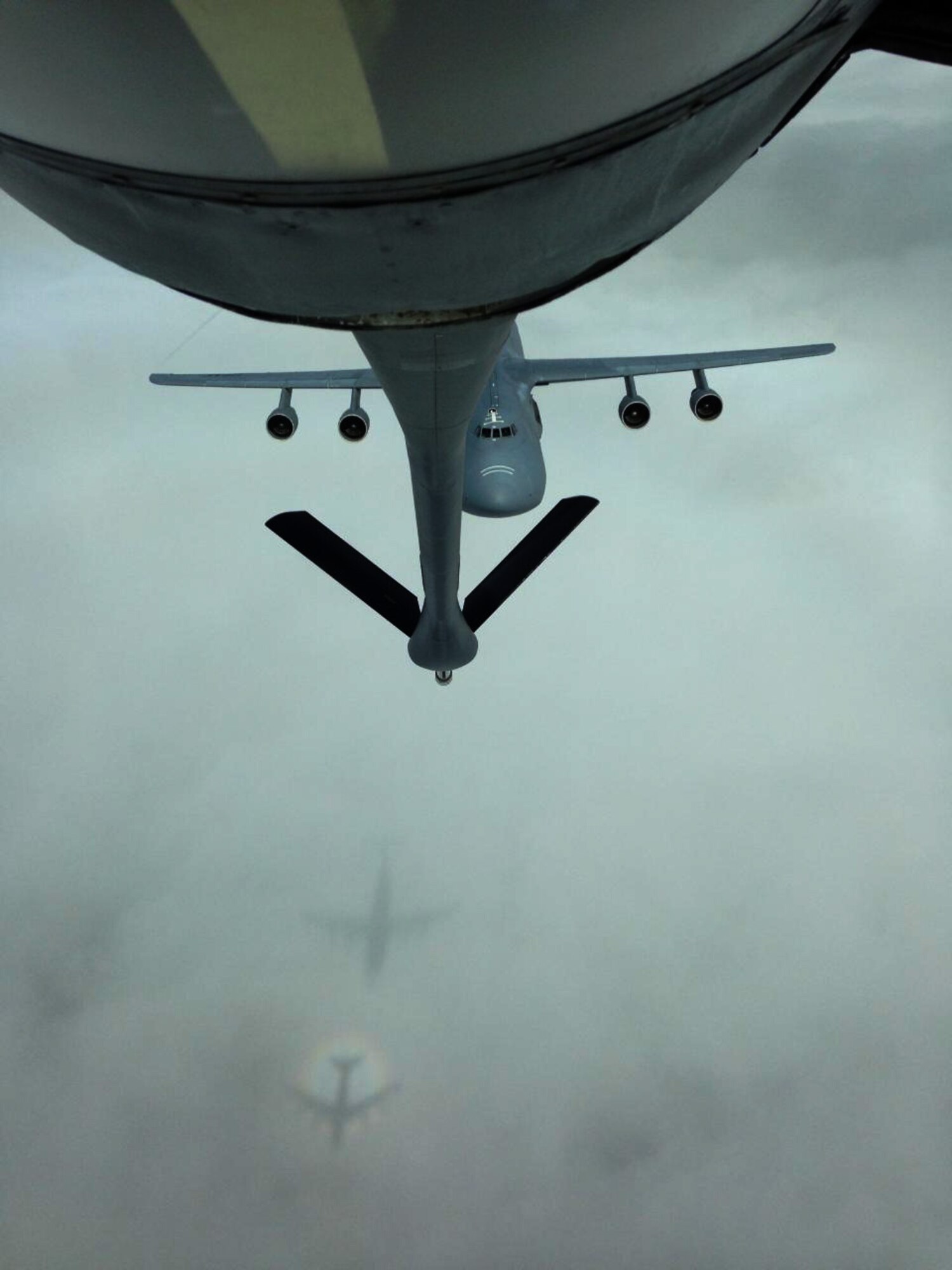 A Total Force aircrew made up of Airmen from the Air Force Reserve 931st Air Refueling Group and active duty 22nd Air Refueling Wing operated a KC-135 Stratotanker to conduct an air refueling training exercise with a C-5 Galaxy Aircraft from the 433rd Airlift Wing, Aug. 1, 2014. Senior Master Sgt. Ray Lewis, 931st Air Refueling Group, and Senior Airman Alexis Mitchell, 22nd Air Refueling Wing, served as the refueling boom operators during the mission. In total, the aircraft spent 3.5 hours on the refueling track. (U.S. Air Force photos by Senior Master Sgt. Ray Lewis)
