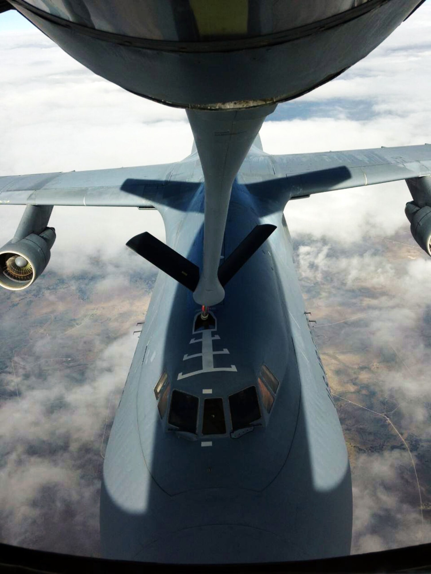 A Total Force aircrew made up of Airmen from the Air Force Reserve 931st Air Refueling Group and active duty 22nd Air Refueling Wing operated a KC-135 Stratotanker to conduct an air refueling training exercise with a C-5 Galaxy Aircraft from the 433rd Airlift Wing, Aug. 1, 2014. Senior Master Sgt. Ray Lewis, 931st Air Refueling Group, and Senior Airman Alexis Mitchell, 22nd Air Refueling Wing, served as the refueling boom operators during the mission. In total, the aircraft spent 3.5 hours on the refueling track. (U.S. Air Force photos by Senior Master Sgt. Ray Lewis)
