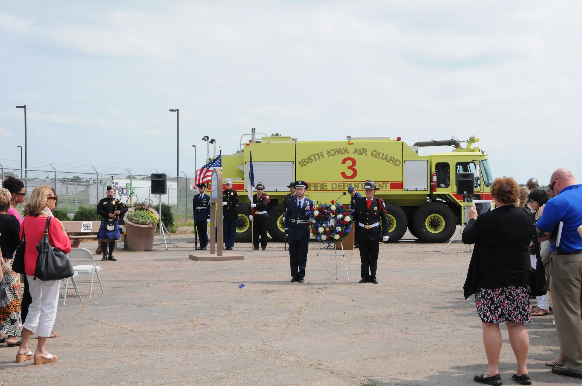 Members of the 185th Air Refueling Wing along with emergency responders gather with survivors of the crash of United Flight 232 on July 19, 2014 to mark the 25th anniversary of the crash in Sioux City, Iowa. A memorial garden was dedicated for the victims of the crash on the spot where the flight first touched down which is now part of the Mid America Museum of Aviation and Transportation. (Air National Guard photo by 1LT Jeremy J. McClure/Released)