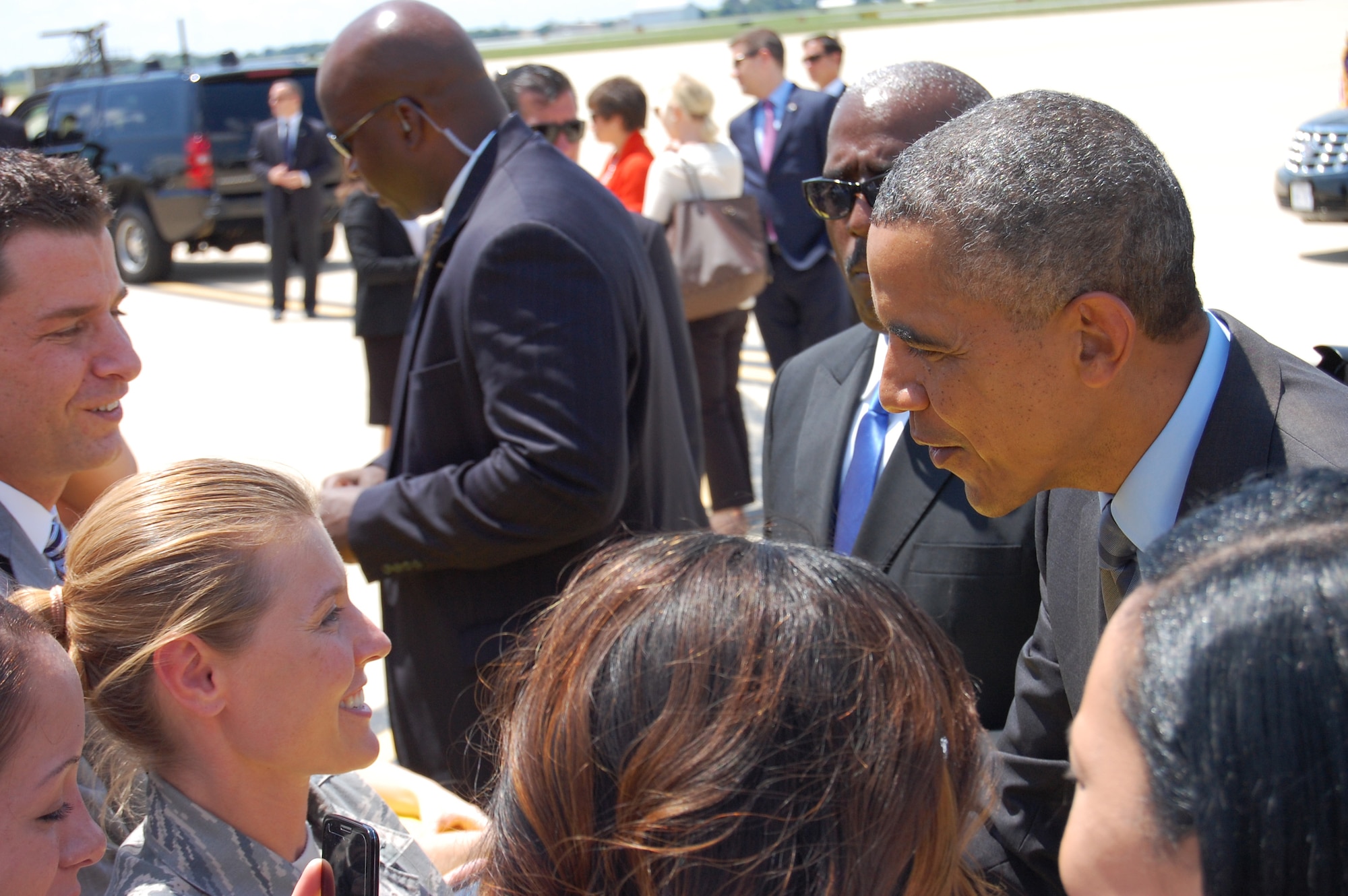 U.S. President Barack Obama greets 2nd Lt. Valerie Harwood, 166th Airlift Wing, as he arrives at the New Castle Air National Guard Base, Del. on July 17, 2014. The president came to the home of the 166th Airlift Wing, Delaware Air National Guard en route to the Port of Wilmington, Delaware to announce a new initiative to increase private sector investment in our nation’s infrastructure. (U.S. Air National Guard photo by Tech. Sgt. Benjamin Matwey)