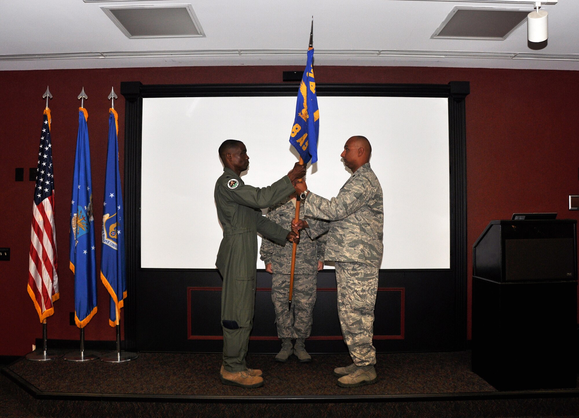 Lt. Col. Lewell B. Skinner assumes command of the 914th Operation Support Squadron here, August 2, 2014. (U.S. Air Force photo by Staff Sgt. Stephanie Sawyer) 