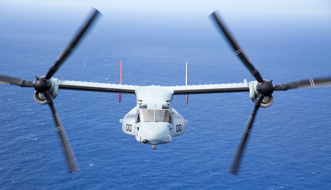 An MV-22B Osprey tiltrotor aircraft flies over the open sea between Iwo To and Chichi Jima, Japan, July 29. The Osprey flew to Iwo To and Chichi Jima to demonstrate the far-reaching and quick response capabilities of the aircraft. Given the capabilities of the MV-22B Osprey, which have been consistently demonstrated during humanitarian assistance and disaster relief operations and exercises around the Asia-Pacific, it provides a reliable and effective means for response to future medical or humanitarian and relief needs for remote locations throughout Japan. The Osprey and crew are with Marine Medium Tiltrotor Squadron 265, Marine Aircraft Group 36, 1st Marine Aircraft Wing, III Marine Expeditionary Force.