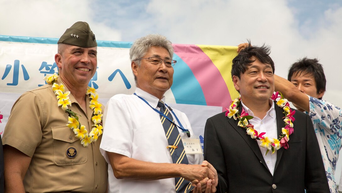 From left to right, Lt. Gen. John Wissler, Kazuo Morishita and Itsunori Onodera pose for a photo July 28 on Chichi Jima, Japan. Onodera and Wissler arrived to the remote island via an MV-22B Osprey tiltrotor aircraft to demonstrate the long-range and quick response capabilities of the aircraft in the event of humanitarian assistance and disaster relief efforts. They also spoke with the Ogasawara village assembly to discuss Japan’s future acquisition of Ospreys. Given the capabilities of the Osprey, which have been consistently demonstrated during humanitarian assistance and disaster relief operations and exercises around the Asia-Pacific, the aircraft provides a reliable and effective means for future response to medical, humanitarian and relief needs. Wissler is the commanding general of III Marine Expeditionary Force. Morishita is the Ogasawara village mayor, and Onodera is the minister of defense for Japan.
