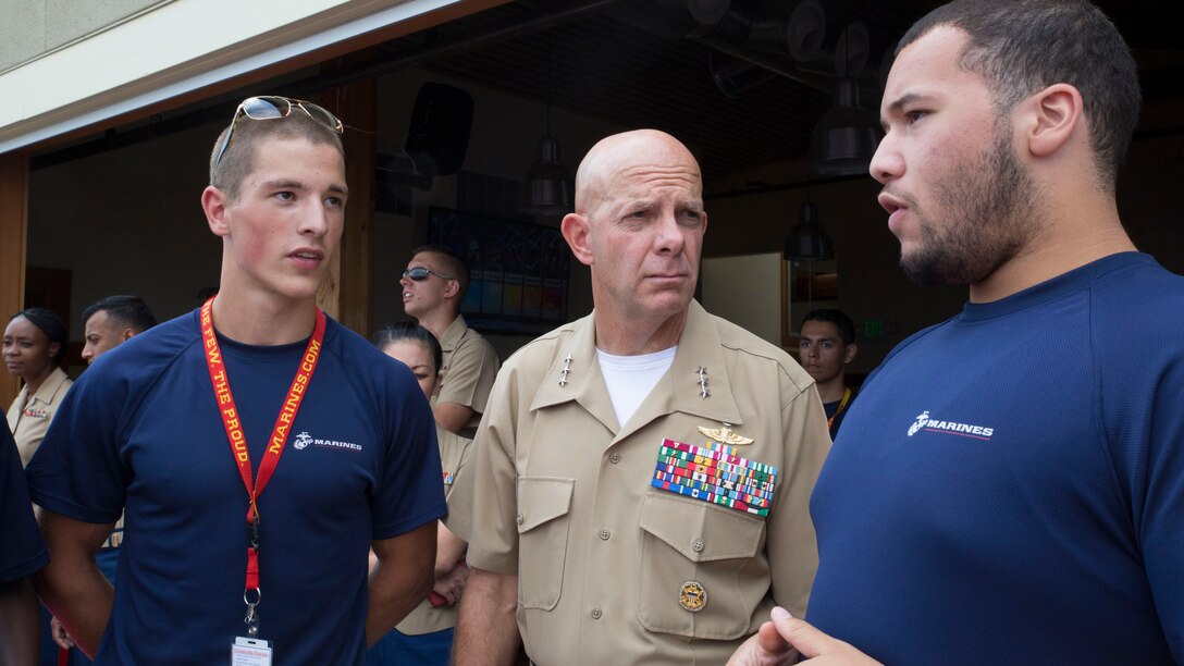 Winter Krimmer (left) and Greg Tauti (right), students from the Marine Week Leadership Academy, discuss their academy experience with I Marine Expeditionary Force Commanding General, Lieutenant General David H. Berger at Seattle's Seafair and Marine Week 2014, August 2. The two boys joined several boys and girls (ages 10-17) from the Seattle area beginning 29 July to be physically and mentally challenged and learn leadership traits and principles by United States Marines with Marine Corps Recruiting
 Command and supporting units. Marine Week Seattle showcases Marine Corps equipment, aircraft and technological capabilities to the general public. More than 700 Marines are participating in Marine Week Seattle to give Seattleites the opportunity to meet the individual Marine and celebrate community, country and Corps.