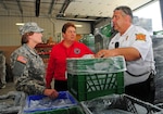 Maj. Gen. Deborah A. Ashenhurst, adjutant general of the Ohio National Guard, visits with emergency personnel Aug. 3, 2014, in Toledo, which is experiencing a clean-water emergency. Pictured in center is Sima Merick, assistant director of the Ohio Emergency Management Agency.