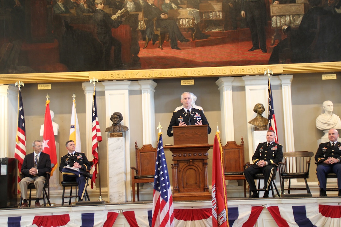 Col. Christopher Barron, addresses the audience at the New England District Change of Command Ceremony at Faneuil Hall, Boston, Mass., where he was given command as District Engineer of the U.S. Army Corps of Engineers, New England District by Brig. Gen. Kent Savre, commander, U.S. Army Corps of Engineers, North Atlantic Division, who was also the presiding officer over the ceremony.
