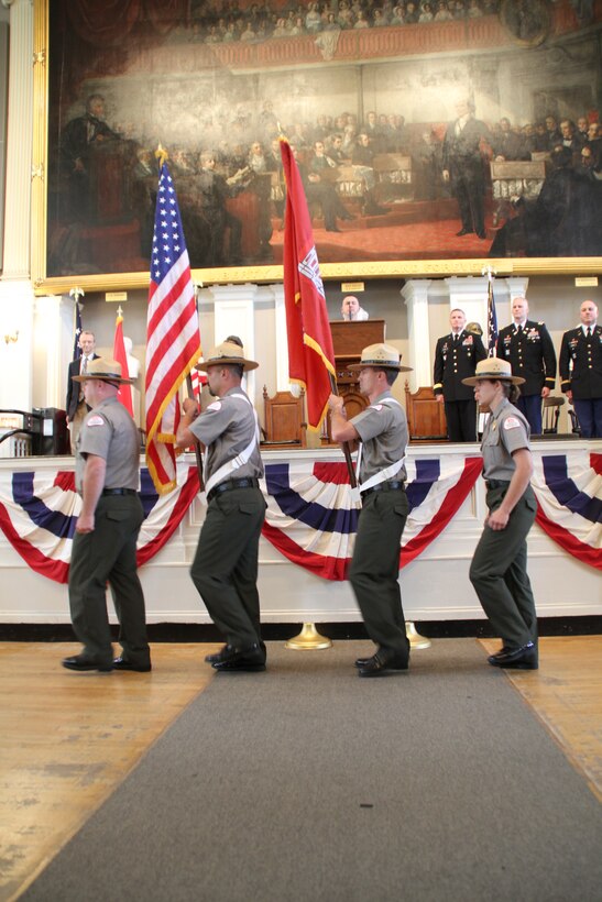 New England District Color Guard prepare to retire the colors. The reviewing pary consists of Brig. Gen. Kent Savre, commander, North Atlantic Division, Col. Christopher Barron, incoming district engineer and commander, New England District, Col. Charles Samaris, outgoing district commander, and Bill Scully, deputy district engineer for Project Management, New England District, U.S. Army Corps of Engineers.