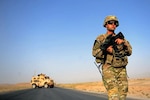 Army Sgt. Brandon Bregel, team leader, prepares to clear a bridge during a bridge quality assurance inspection along Highway 1 in Zabul province, Afghanistan, Aug. 22, 2011. Through the U.S. Army's Comprehensive Soldier Fitness program, Soldiers like Bregel can better prepare for the physical and emotional trials of combat.