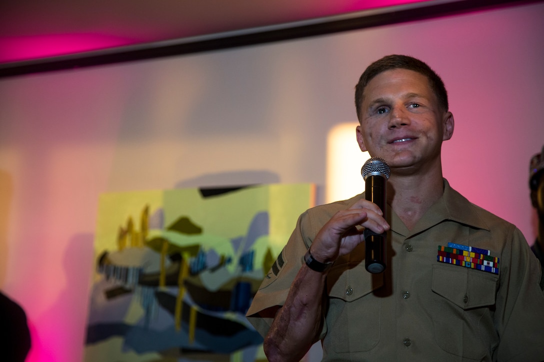 U.S. Marine Corps Cpl. Kyle Carpenter, the youngest living Medal of Honor recipient to date, speaks at the Seafair Gala during Marine Week Seattle at the Columbia Tower, Aug. 1, 2014. Marine Week Seattle showcases Marine Corps equipment, aircraft and technological capabilities to the general public. More than 700 Marines are participating in Marine Week Seattle to give Seattleites the opportunity to meet the individual Marine and celebrate community, country and Corps.