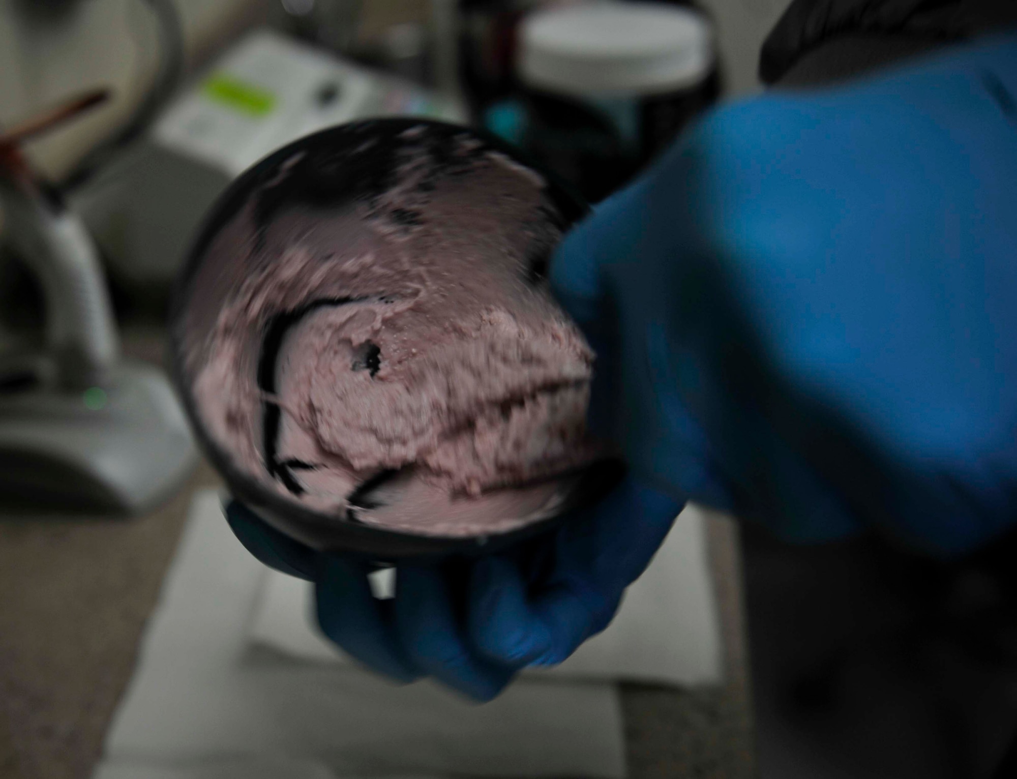 Dr. Ryan Gustafson, 51st Dental Squadron general dentist, mixes alginate and water to make a mouth guard on Osan Air Base, Republic of Korea, July 31, 2014. It takes approximately one minute for the alginate mix to set. (U.S. Air Force photo/Senior Airman David Owsianka)