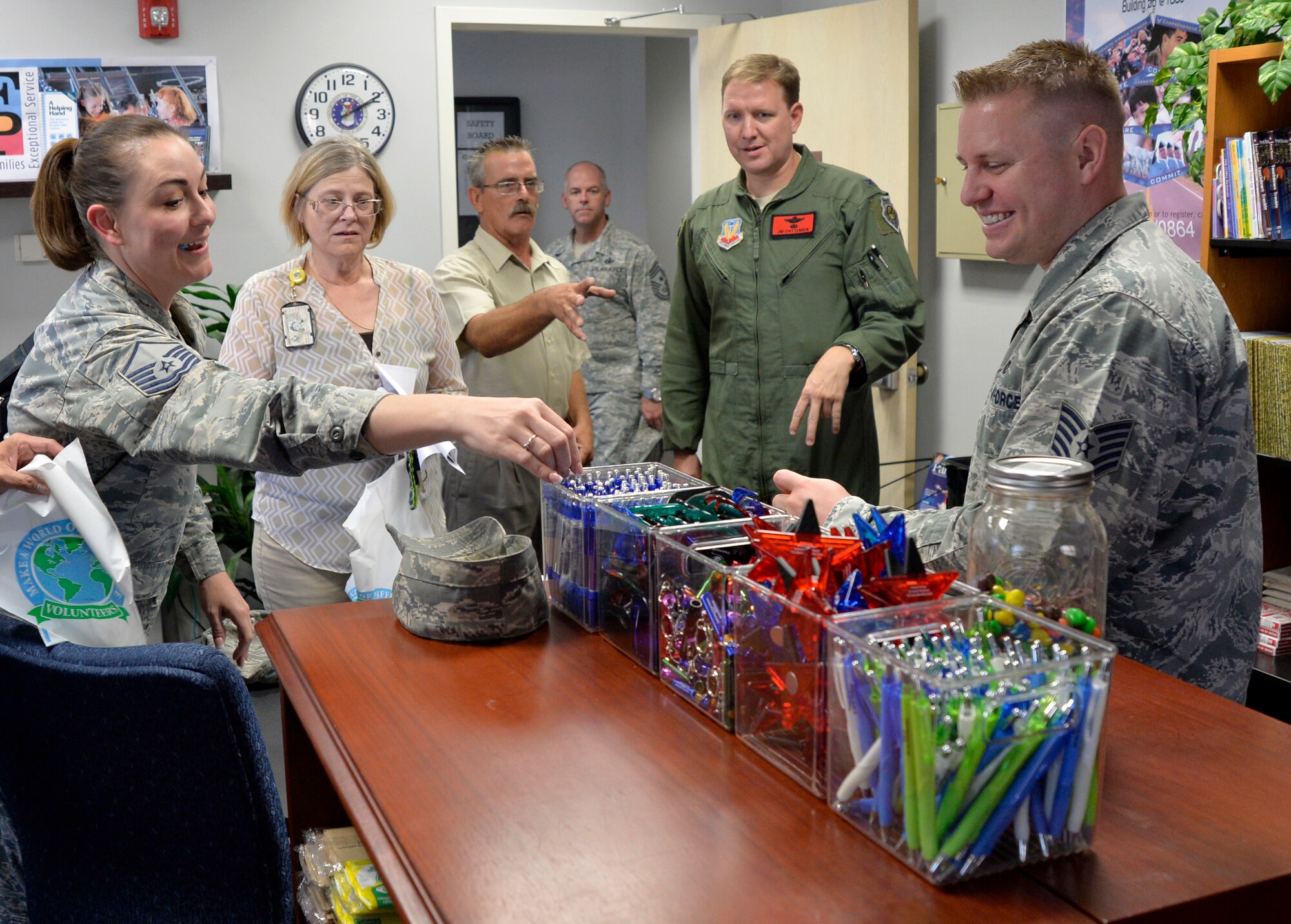 Col. James Chittenden, 432nd Wing/432nd Air Expeditionary Wing Vice Commander, explores the Airman & Family Readiness Center facility during the Grand Opening event July 31, 2014, at Creech Air Force Base, Nev. The A&FRC provides Airmen and families with activities and services which promote self-sufficiency, mission readiness and adaptation to the Air Force way of life. (U.S. Air Force photo by Tech. Sgt. Shad Eidson/Released)