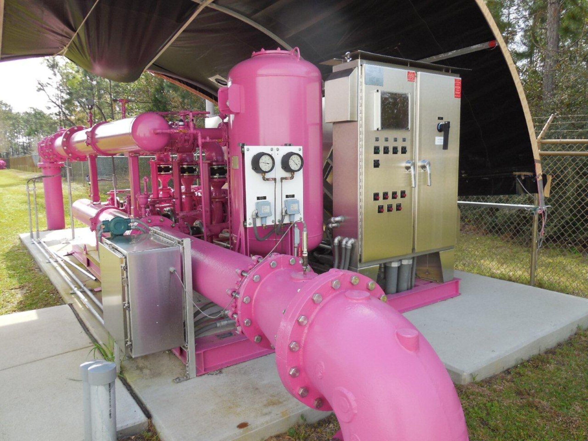 Engineers at Hurlburt Field, Fla., expanded and improved the installation's
graywater distribution system to reduce demand on the local water supply.
Forty-thousand feet of new piping and a 500,000 gallon storage tank help the
base save 13 million gallons of potable water a year formally used for
industrial and irrigation needs. The Department of Energy chose it as a 2014 Federal Energy Management Program award winner. (U.S. Air Force photo/Released)