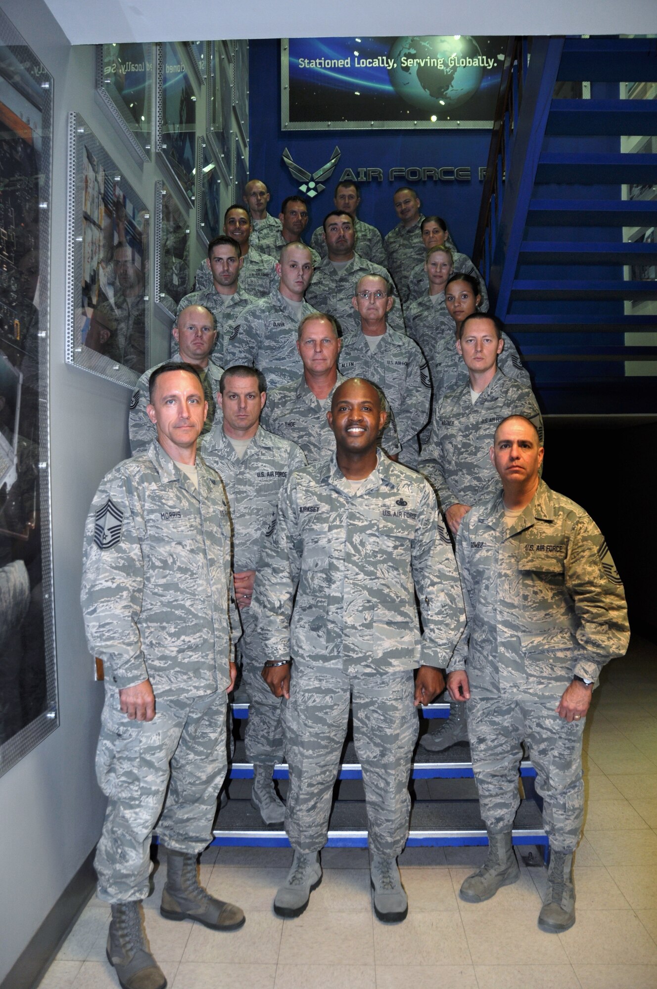 Command Chief Master Sgt. Cameron Kirksey (center front), Air Force Reserve Command, Robins Air Force Base, Georgia, pose with the Military Training Instructors from the 433rd Training Squadron, July 31, 2014.  Kirksey had a working lunch with the MTIs, seeking solutions on how to recruit new Military Training Instructors from the Air Force Reserve and Active Duty. (U.S. Air Force photo by Tech. Sgt. Carlos J. Trevino)