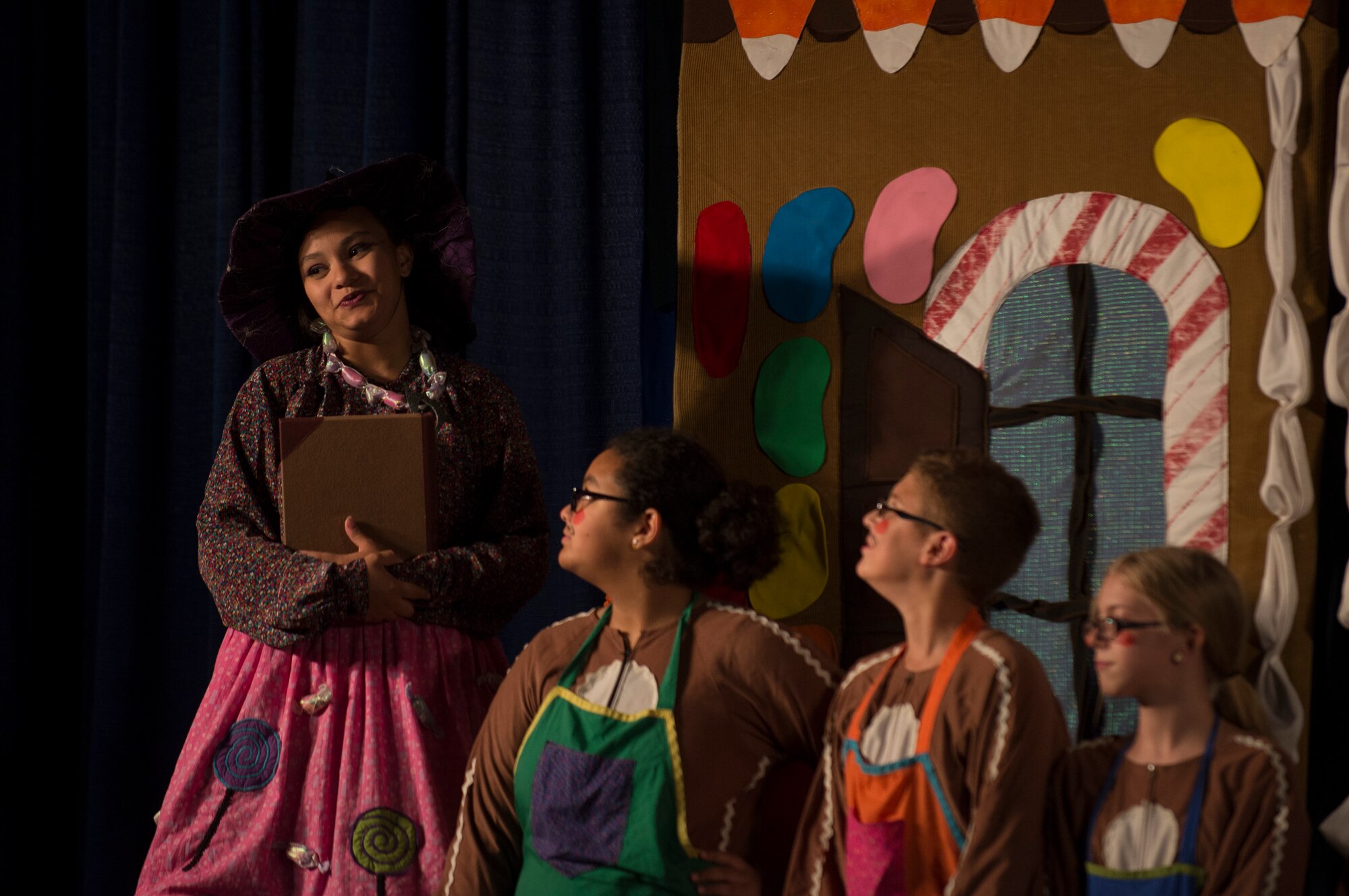 Children from Moody’s Youth Programs sing during a theater play at Moody Air Force Base, Ga., Aug. 1, 2014. More than 150 children and volunteers helped prepare and perform the play. (U.S. Air Force photo by Airman 1st Class Dillian Bamman/Released)