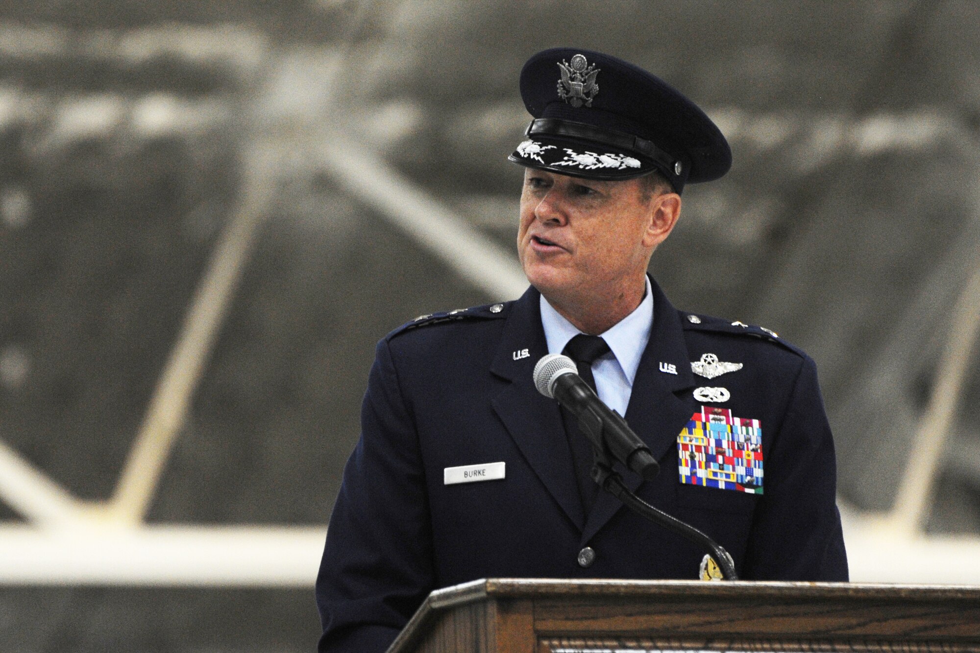 Air Force District of Washington Commander Maj. Gen. Darryl W. Burke addresses Airmen during the AFDW change of command ceremony on Joint Base Andrews, Maryland, July 22, 2014. As the AFDW commander, Burke plans to set clear priorities to help his Airmen focus on the mission. “I have found in an organization if you set priorities and say, ‘These are the big things I’m working on,’ then your organization can focus together,” he said. “I think if you keep the priorities straight, then everyone knows what they are working toward, and it makes it easier to do the job.” (U.S. Air Force photo/Master Sgt. Tammie Moore)