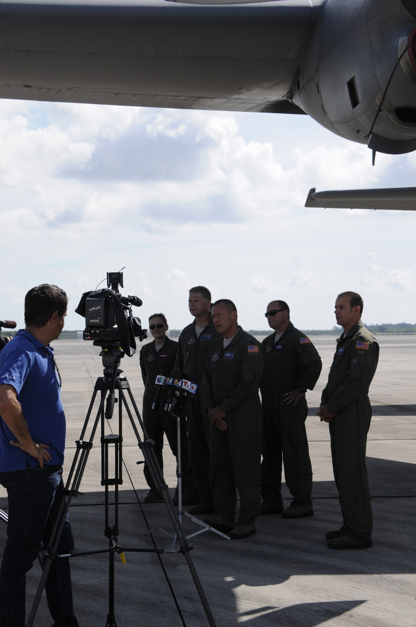 Skilled air crew from the 910th Airlift Wing in Youngstown, Ohio speak with local press about aerial spray mission at Homestead Air Reserve Base, Fla., July 31. The flight crew is environmentally conscious and works with local authorities to prevent harming critical habitat areas and national parks. (U.S. Air Force photo by/Senior Airman Aja Heiden)
