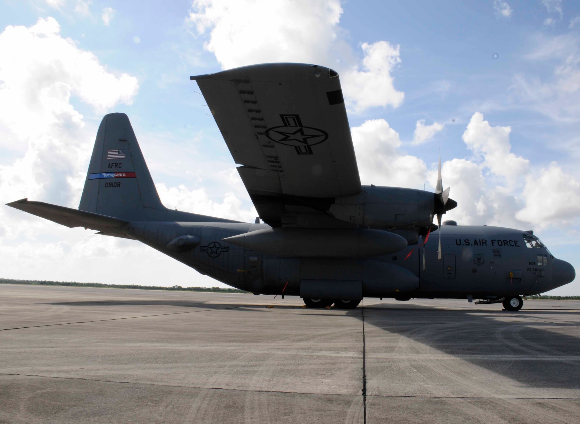 The 910th Airlift Wing's C-130 Hercules cargo plane sits as a static display at 
Homestead Air Reserve Base, Fla., July 31. The plane was used to distribute
Dibrom to reduce the mosquito population in Homestead and the surrounding Miami-Dade County.  (U.S. Air Force photo by/Senior Airman Aja Heiden)
