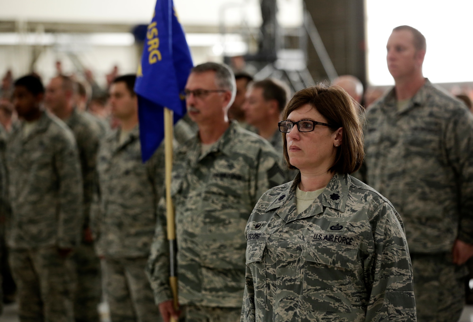 Lt. Col. Tina Lipscomb, 123rd Intelligence Squadron commander, stands in formation with her Airmen during the 188th Wing’s Conversion Day ceremony June 7, 2014, at Ebbing Air National Guard Base, Fort Smith, Arkansas. The 123rd, formerly a geographically separated unit with the Arkansas Air National Guard located at Little Rock Air Force Base, Arkansas, now falls under the 188th Intelligence, Surveillance and Reconnaissance Group of the newly redesignated 188th Wing. The 123rd will physically move its operation to the 188th over the next two years as part of the 188th’s mission conversion from A-10C Thunderbolt II “Warthogs” to ISR and remotely piloted aircraft. (U.S. Air National Guard photo by Master Sgt. Mark Moore/released) 