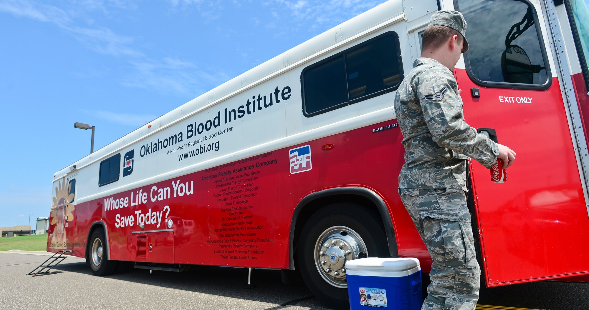 Airman 1st Class Ryan Martin, a communications focal point operator in the 137th Communications Flight, exits an Oklahoma Blood Institute mobile blood donation unit August 2 at Will Rogers Air National Guard Base in Oklahoma City. Guard members were encouraged to donate during drill weekend  to the Oklahoma Blood Institute, an organization that supplies blood to hospitals in Oklahoma and surrounding areas. (U.S. Air Force photo by Airman 1st Class Tyler Woodward/released) 