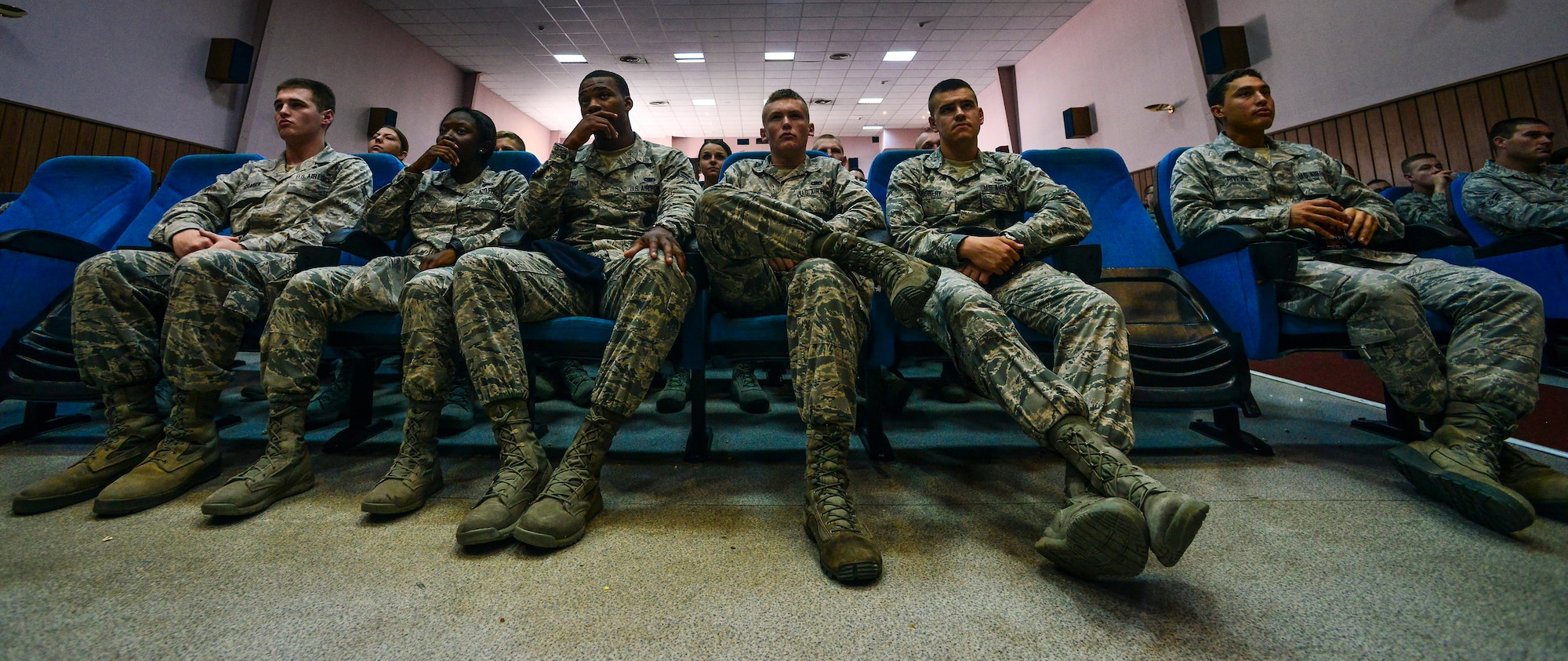 Airmen watch a driving safety video during a Street Smart presentation Aug. 1, 2014, Incirlik Air Base Turkey.  Florida firefighters From the Stay Alive from Education Inc. shared the possible consequences of not wearing seatbelts, eating and texting while driving and driving under the influence of alcohol.  (U.S. Air Force photo by Senior Airman Nicole Sikorski/Released) 
 