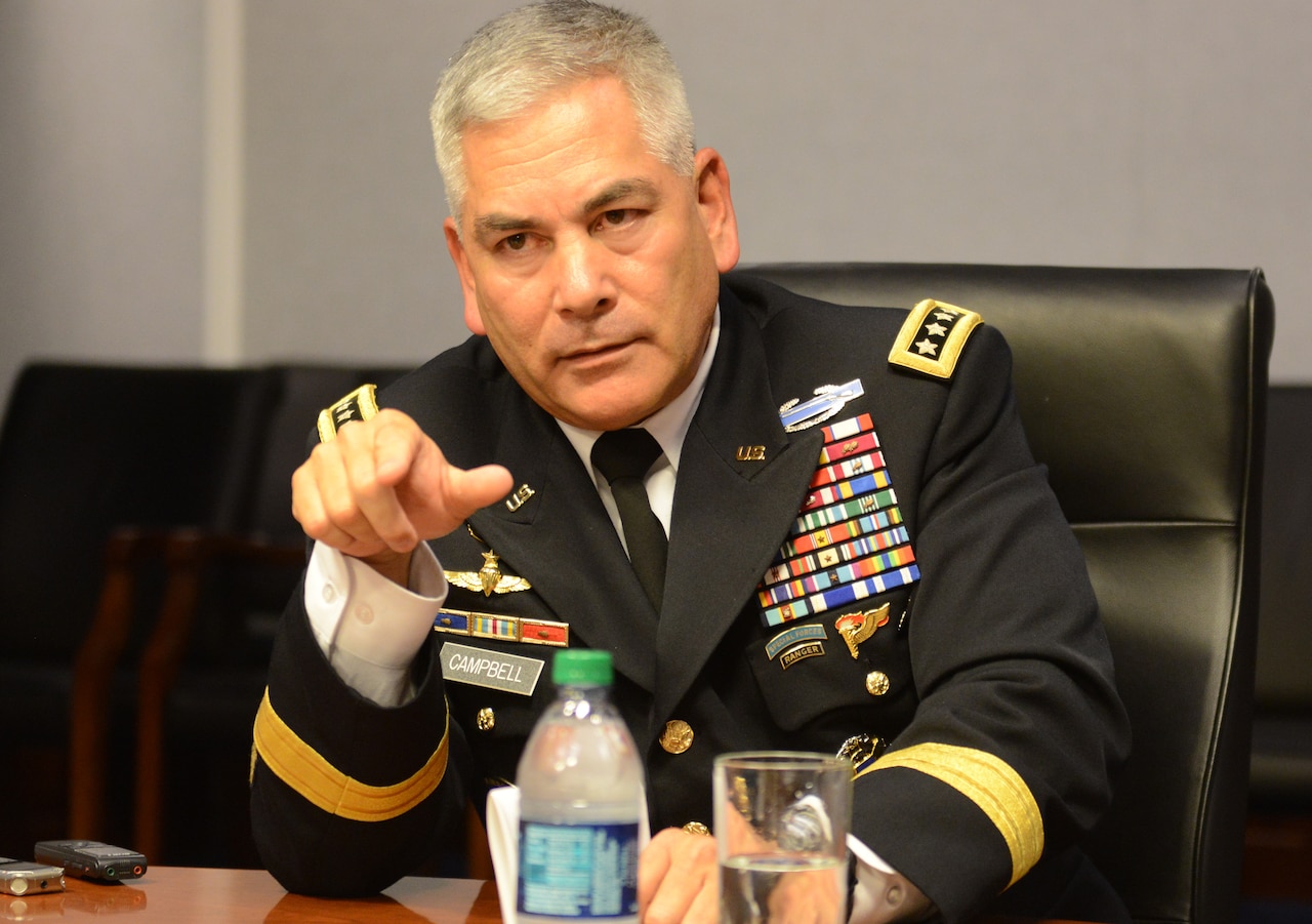 Army Vice Chief of Staff Gen. John F. Campbell makes a point during his farewell media roundtable at the Pentagon, Aug. 1, 2014. He leaves for Afghanistan later this month to be the next International Security Assistance Force and U.S. Forces Afghanistan commander. U.S. Army photo by David Vergun