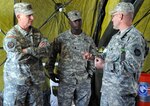 Leadership from Joint Task Force 71 meets with the 2nd Chemical Battalion at Fort Hood to share best practices and discuss chemical capabilities, Jan. 26, 2012. By meeting its active Army counterparts, Joint Task Force 71 builds working relationships with units it might one day work alongside in the event of a natural or chemical incident.