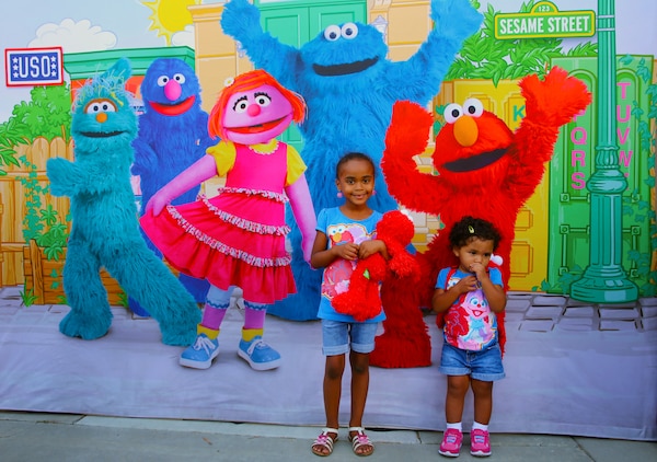 Qailyn, 5, and Jayden, 20 months, attended a Sesame Street/USO performance at the Camp Pendleton Base Theater, July 31.


The Sesame Street/USO Experience for Military Families is playing Thursday, July 31 and Friday, August 1 at the base theater for military ID holders and their guests. This year marks the tours fourth year visiting military installations in the U.S. and abroad. 

“The Sesame Street/USO tour was created 6 years ago and we couldn’t be more proud of all the moments we have had at home and abroad. As we celebrate the kick-off of our latest installment and venture out to visit, entertain and uplift even more military families this year,” said John I. Pray, Jr. USO President and CEO. “We are grateful to our family at Sesame Street who not only understand the unique challenges today’s military families face but also share our commitment to supporting them every step of the way.”

