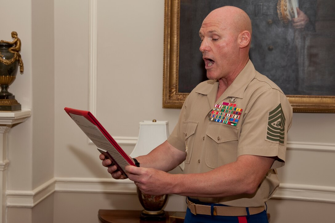 Sgt. Maj. Micheal P. Barrett, the 17th Sergeant Major of the Marine Corps, attends a promotion ceremony for Sgt. Nicholas F. Sanquist at the Home of the Commandants, Washington D.C., on Aug. 1, 2014. (U.S. Marine Corps photo by Lance Cpl. Samantha K. Draughon/ Released)