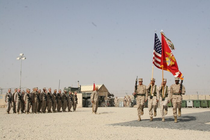 A Marine color guard with Combat Logistics Battalion 1 marches on the colors during a transfer of authority ceremony held for CLB-7 and CLB-1 aboard Camp Leatherneck, Helmand province, Afghanistan, Aug. 1, 2014. Combat Logistics Battalion 1 replaced CLB-7 as the last unit to aid Regional Command (Southwest) with tactical-level logistical support and will close out another chapter in Marine Corps history as the last unit to serve as the logistics combat element for RC(SW).