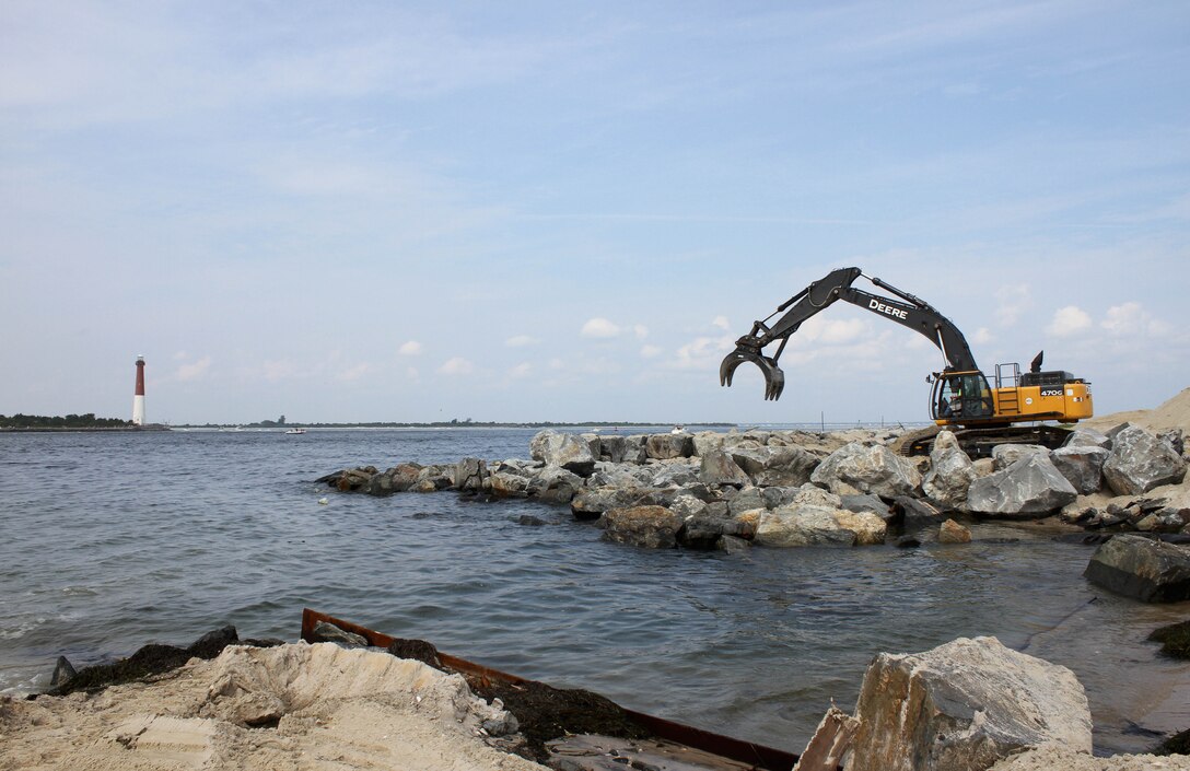 The U.S. Army Corps of Engineers' Philadelphia District and its contractor Agate Construction Company make repairs along a section of the Barnegat Inlet North Jetty from damages sustained during Hurricane Sandy. The $7.6 million project began in the spring of 2014 and is expected to be complete in the fall of 2014.