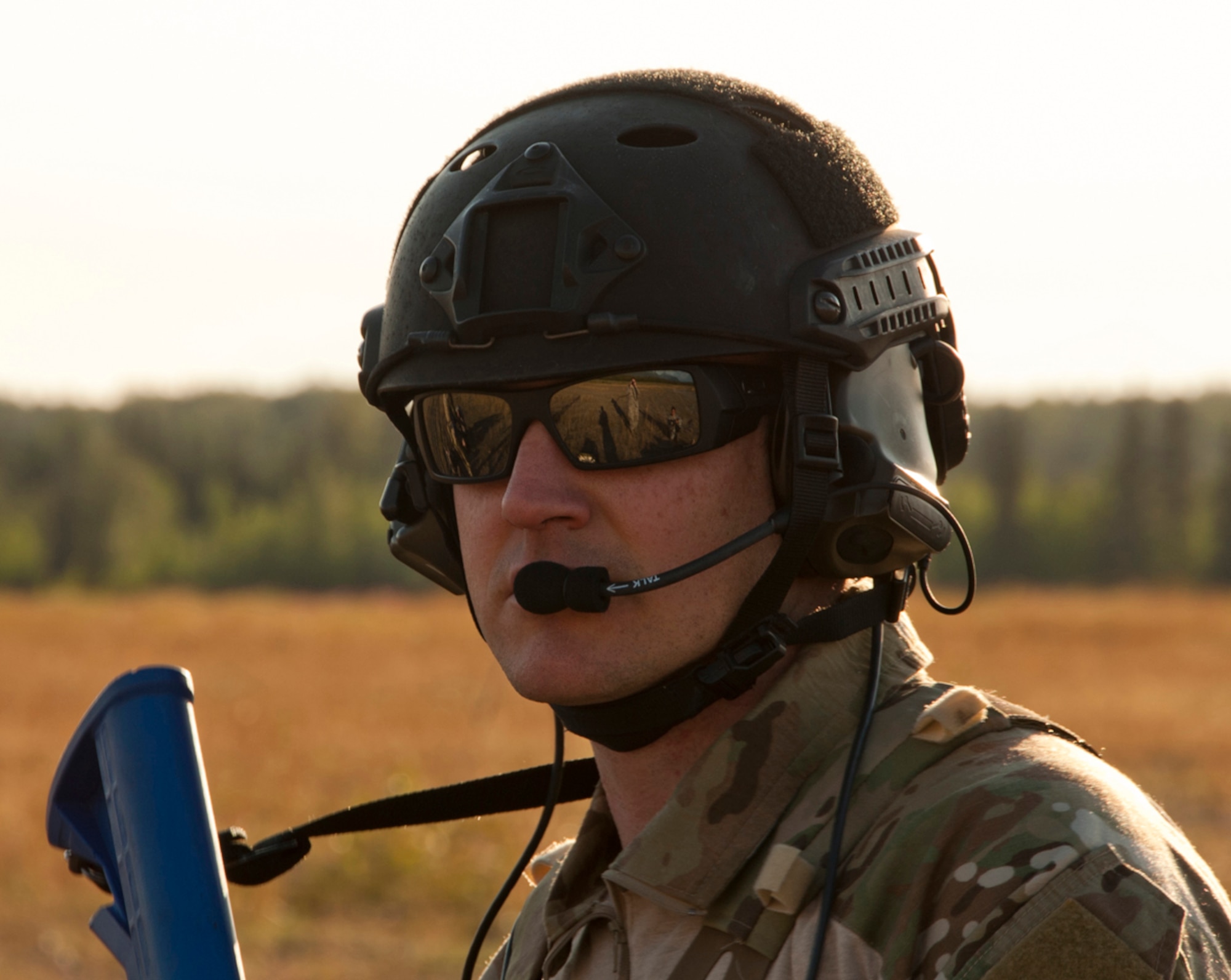 Air National Guard Capt. Aaron Zamora, 212th Rescue Squadron pararescueman, watches his pararescue team during a routine training mission on Joint Base Elmendorf-Richardson, Alaska, July 30, 2014. The Rescue Squadron trains their team for any military and civilian missions where they may be tasked to recover, rescue or execute a medical evacuation. (U.S. Air Force photo/Airman 1st Class Tammie Ramsouer)