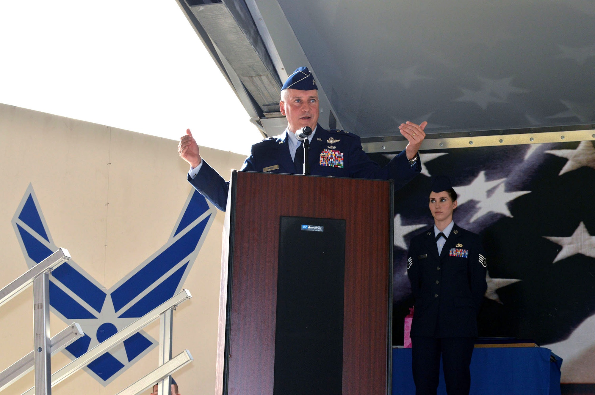 Maj. Gen. Frederick H. Martin, U.S. Air Force Expeditionary Center commander, provides comments as the presiding officer during the 43rd Airlift Group’s change of command ceremony on Aug. 5, Pope Army Airfield, N.C. Col. Kenneth E. Moss, 43rd Airlift Group commander, took command from the outgoing commander, Col. Daniel H. Tulley, who moves on to his next assignment as the commander for the 6th Air Mobility Wing, MacDill Air Force Base, Fla. (U.S. Air Force photo/Marvin Krause)