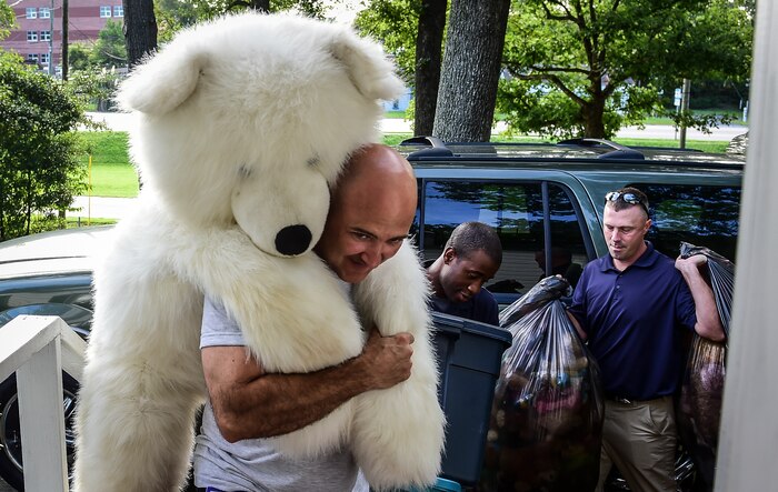 Master Sgt. Eric Rainer, 628th Medical Group first sergeant, Master Sgt. Travis Heath, 628th Communications Squadron first sergeant, and Master Sgt. Tim Wheelis, 14th Airlift Squadron first sergeant, deliver stuffed animals to an organization that provides advocacy as well as therapy for women and children who have been victimized by domestic violence Aug. 5, 2014, in Charleston, S.C. The First Sergeant Council, along with help from Airman 1st Class Diedre Brown, from the 437th Maintenance Squadron, organized a Teddy Palooza Campaign in which Airmen from Joint Base Charleston donated hundreds of stuffed animals.  (U.S. Air Force photo/ Senior Airman Dennis Sloan)