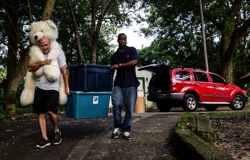 Master Sgt. Eric Rainer, 628th Medical Group first sergeant, and Master Sgt. Travis Heath, 628th Communications Squadron first sergeant, deliver stuffed animals to ’My Sister’s House,’ which  provides advocacy as well as therapy for women and children who have been victimized by domestic violence Aug. 5, 2014, in Charleston, S.C. The First Sergeant Council, along with help from Airman 1st Class Diedre Brown, from the 437th Maintenance Squadron, organized a Teddy Palooza Campaign in which Airmen from Joint Base Charleston donated hundreds of stuffed animals. (U.S. Air Force photo/ Senior Airman Dennis Sloan)