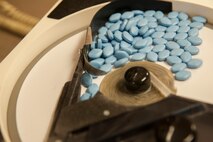 Medication is sorted at the pharmacy on Minot Air Force Base, N.D., July 30, 2014. Pharmacy technicians are responsible for sorting doses of medication, among other duties. (U.S. Air Force photo/Airman 1st Class Apryl Hall)