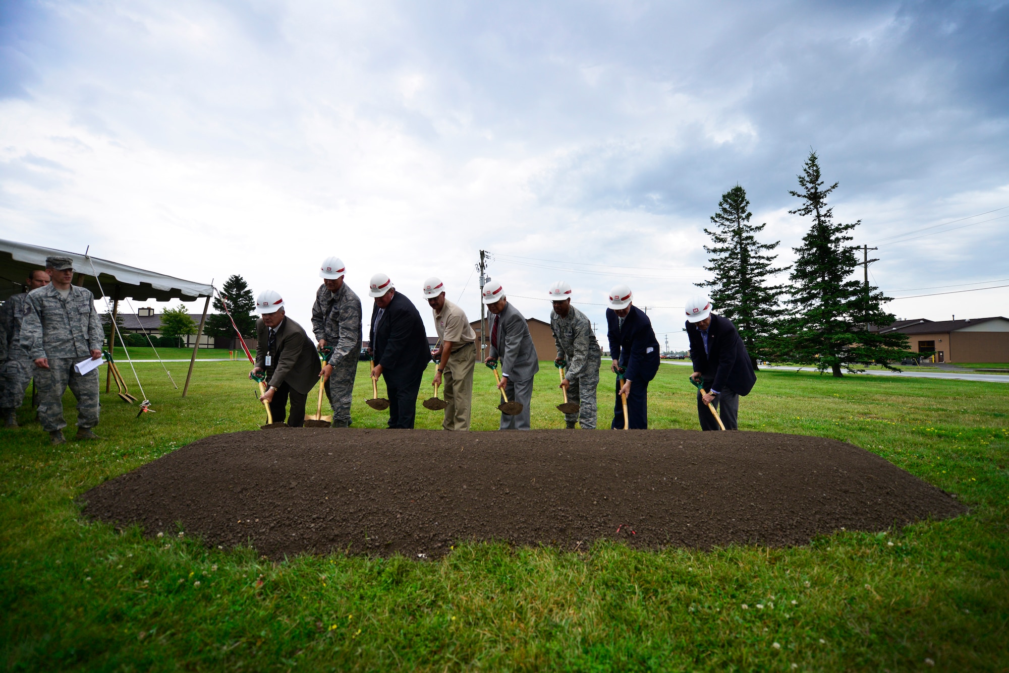 A ground-breaking ceremony is held here, August 5, 2014, for a C-130 Simulator which will be built on the installation and is estimated to bring over 450 students to the base each year as well as provide up to 18 full-time positions. (U.S. Air Force photo by Staff Sgt. Stephanie Sawyer)  