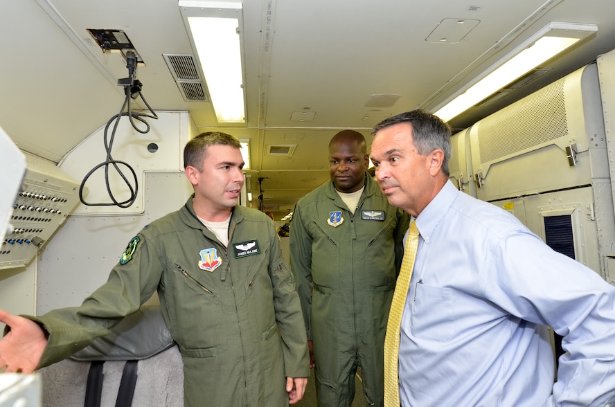 U.S. Air Force 1st Lt. James McClane, a navigator with the 12th Air Command 
and Control Squadron and Georgia Air National Guardsman Maj. Billy Carter, an 
instructor navigator with the 128th Air Command and Control Squadron brief the 
Honorable Randy Toms, Mayor of Warner Robins, Georgia, on the navigation 
system of the E-8C Joint Stars, during a visit to Robins Air Force Base, 
Georgia, Aug. 5, 2014.  The purpose of the visit was to orient the mayor with 
the JSTARS mission and introduce him to the men and women who comprise Team 
JSTARS.  (U.S. Air Force photo by Tech. Sgt. Julie Parker/Released)
