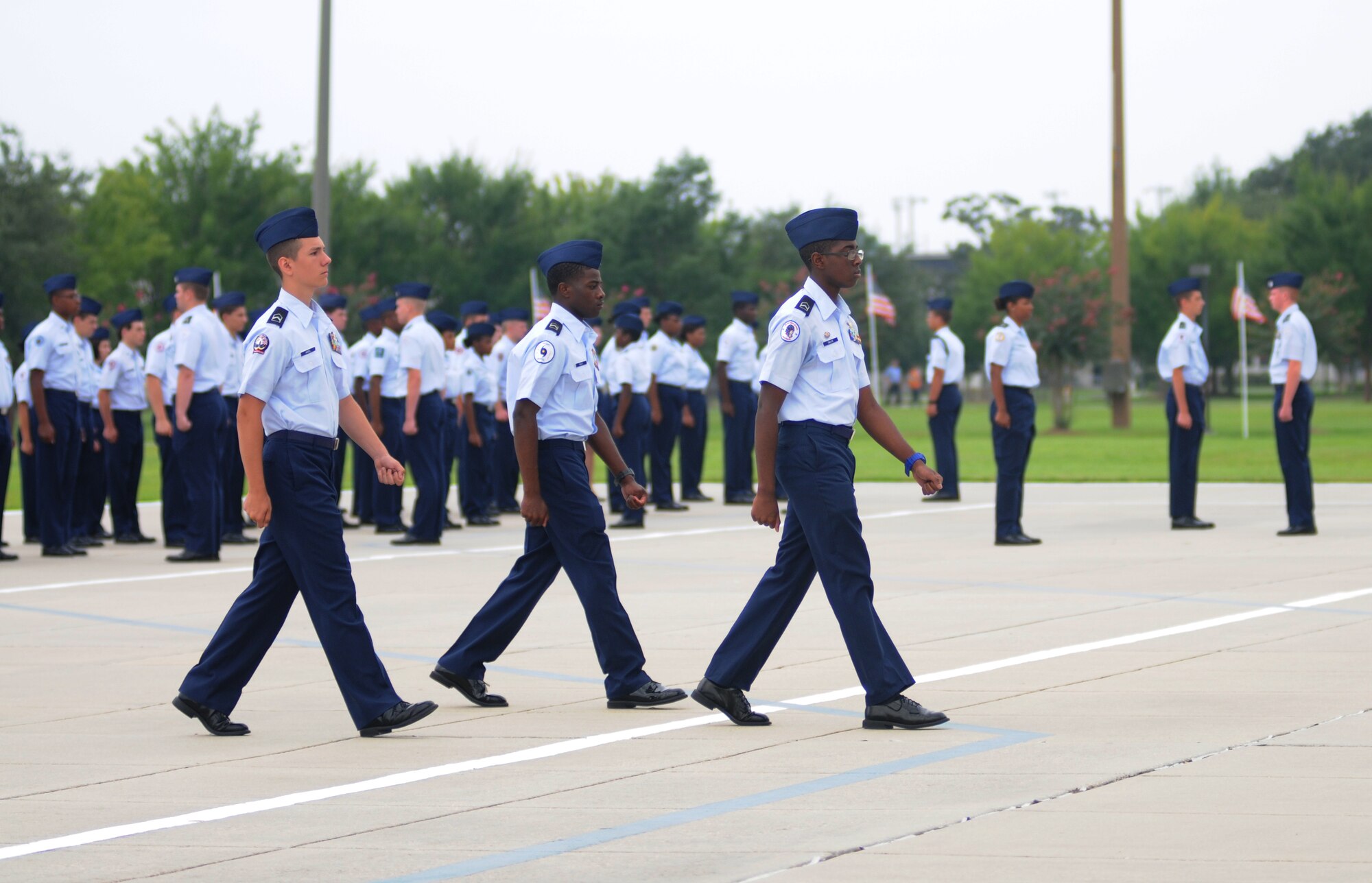 JROTC cadets prepare to march in review during a student parade Aug. 1, 2014, at the Levitow Training Support Facility, Keesler Air Force Base, Miss.  Approximately 100 JROTC students from seven states attended a week-long JROTC Summer Leadership School at Keesler that ended with the parade and a graduation ceremony at the Welch Theater.  (U.S. Air Force photo by Kemberly Groue)