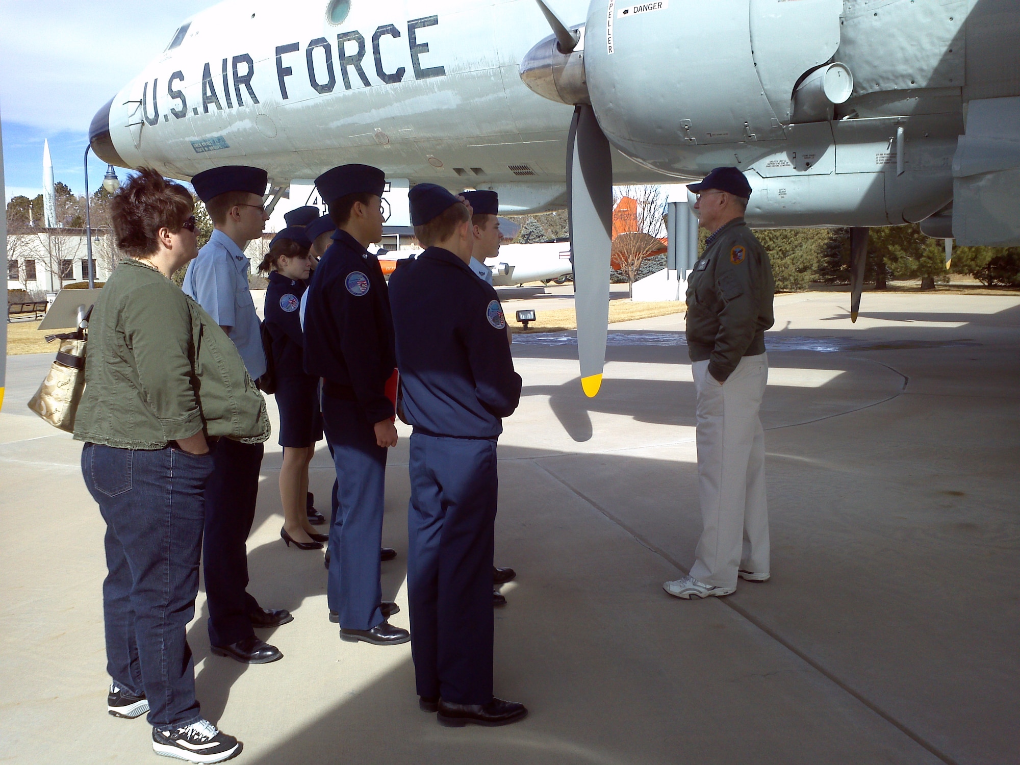 PETERSON AIR FORCE BASE, Colo. — Dave Austin, a Peterson museum volunteer and retired chief master sergeant, provides a tour of the museum's EC-121 “Warning Star” radar aircraft to a group of Air Force Junior ROTC cadets from Air Academy High School. Austin is a former crew member on EC-121s with duty as an airborne radar systems operator. (U.S. Air Force photo)