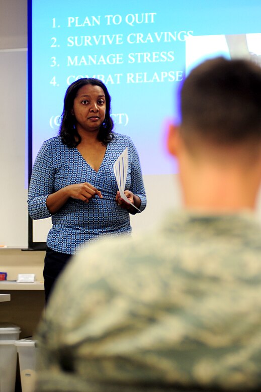 Monica Richardson, 633rd Aerospace Medicine Squadron Health Promotion manager, briefs a Tobacco Cessation Class at Langley Air Force Base, Va., July 23, 2014. Though the Health and Wellness Center will close on Oct. 1, the Tobacco Cessation Classes will not be negatively affected its transition to the Health Promotion program. (U.S. Air Force photo by Airman 1st Class Areca T. Wilson/Released) 