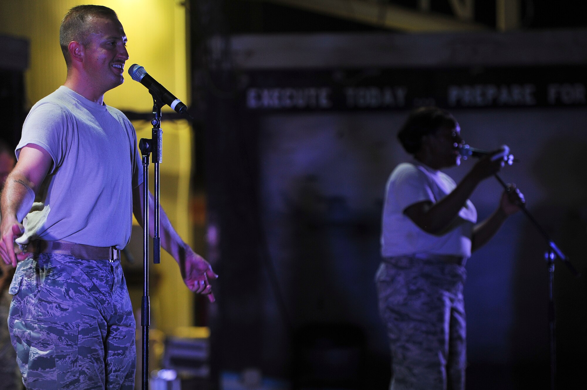 The U.S. Air Force Central Command Band performs for Airmen at the Thirsty Camel July 31, 2014, at an undisclosed location in Southwest Asia. The seven-member band spent three days here entertaining service members. (U.S. Air Force photo by Tech. Sgt. Russ Scalf/Released)