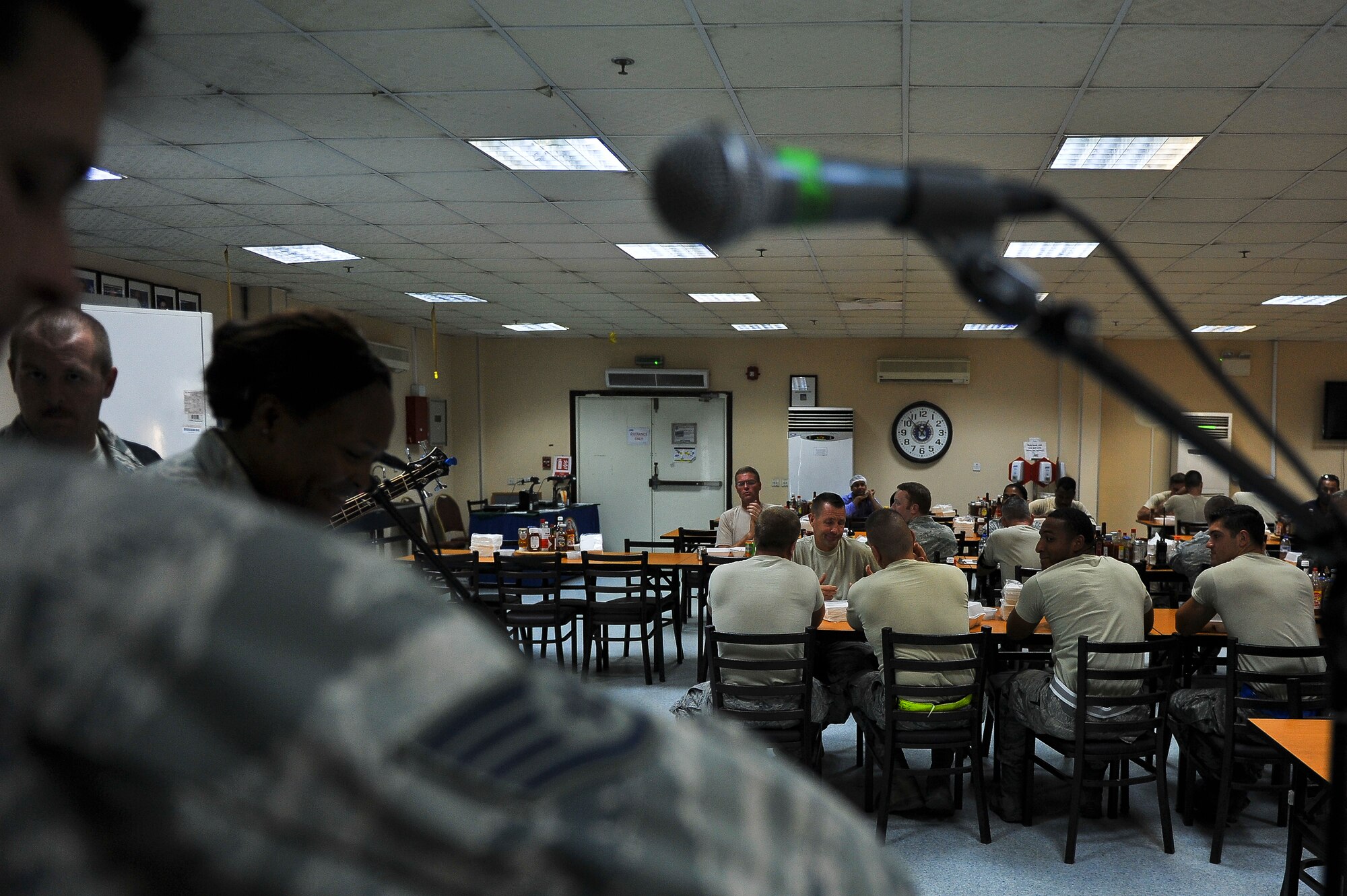 The U.S. Air Force Central Command Band performs for Airmen inside Roy’s Dining Facility July 31, 2014, at an undisclosed location in Southwest Asia. The seven-member band spent three days here entertaining service members. (U.S. Air Force photo by Tech. Sgt. Russ Scalf/Released)