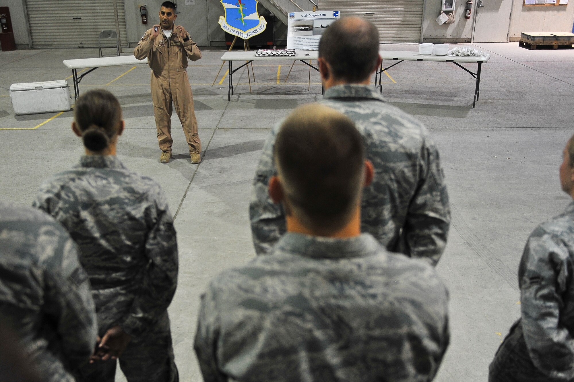Lt. Col. Alex Castro, the 99th Expeditionary Reconnaissance Squadron commander, speaks at the U-2 anniversary celebration Aug. 1, 2014, at an undisclosed location in Southwest Asia. The celebration marked the 59th anniversary of the aircraft.(U.S. Air Force photo by Tech. Sgt. Russ Scalf/Released)