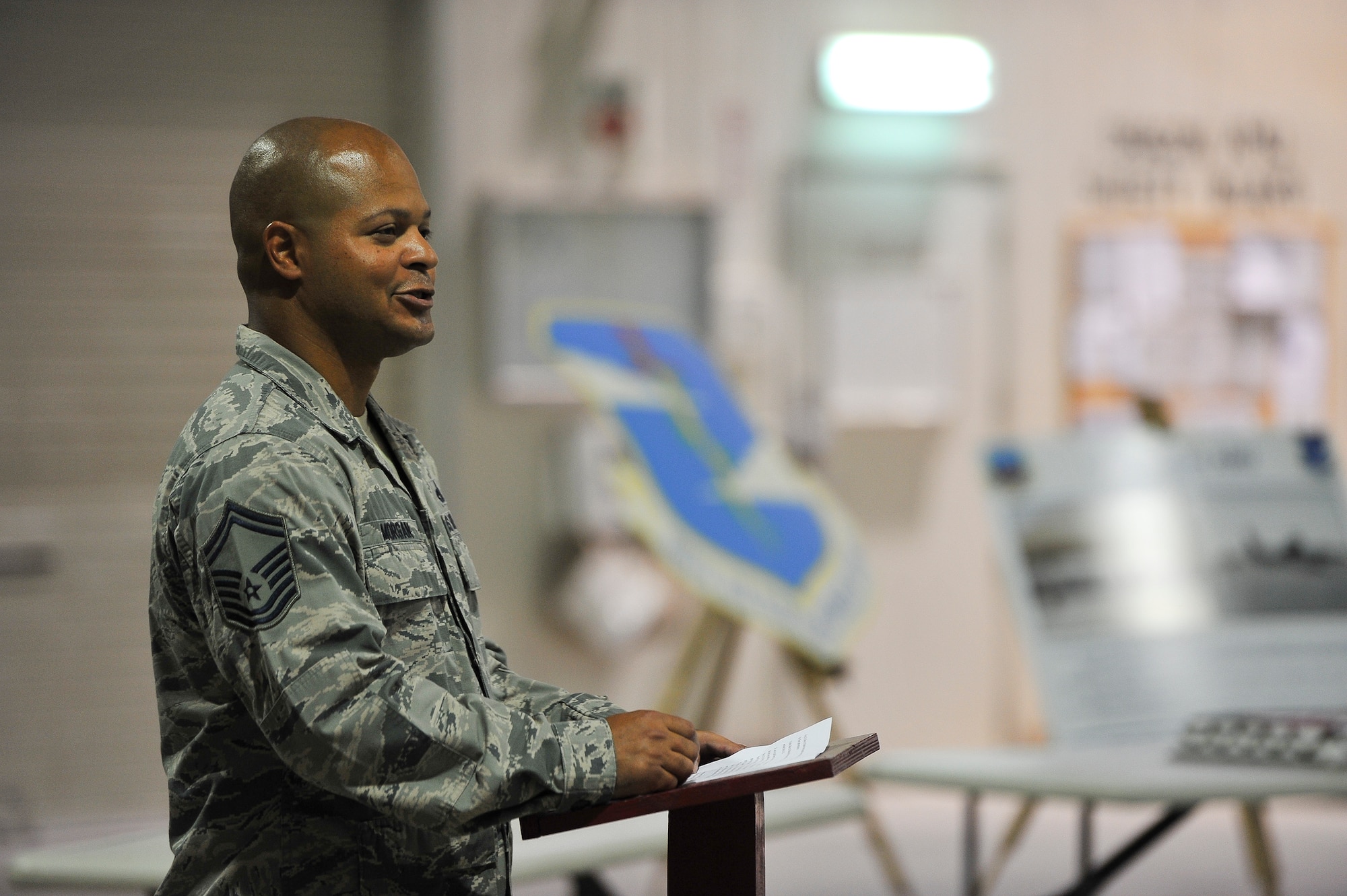 Senior Master Sgt. David Morgan, the 380th Expeditionary Aircraft Maintenance Squadron dragon aircraft maintenance unit superintendent, speaks at the U-2 anniversary celebration Aug. 1, 2014, at an undisclosed location in Southwest Asia. The celebration marked the 59th anniversary of the aircraft. (U.S. Air Force photo by Tech. Sgt. Russ Scalf/Released)