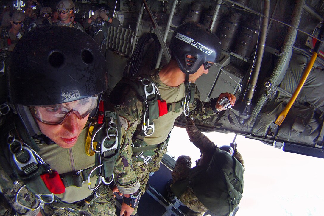 U.s. Paratroopers Stand Ready At An Altitude Of 15,000 Feet Aboard A C 