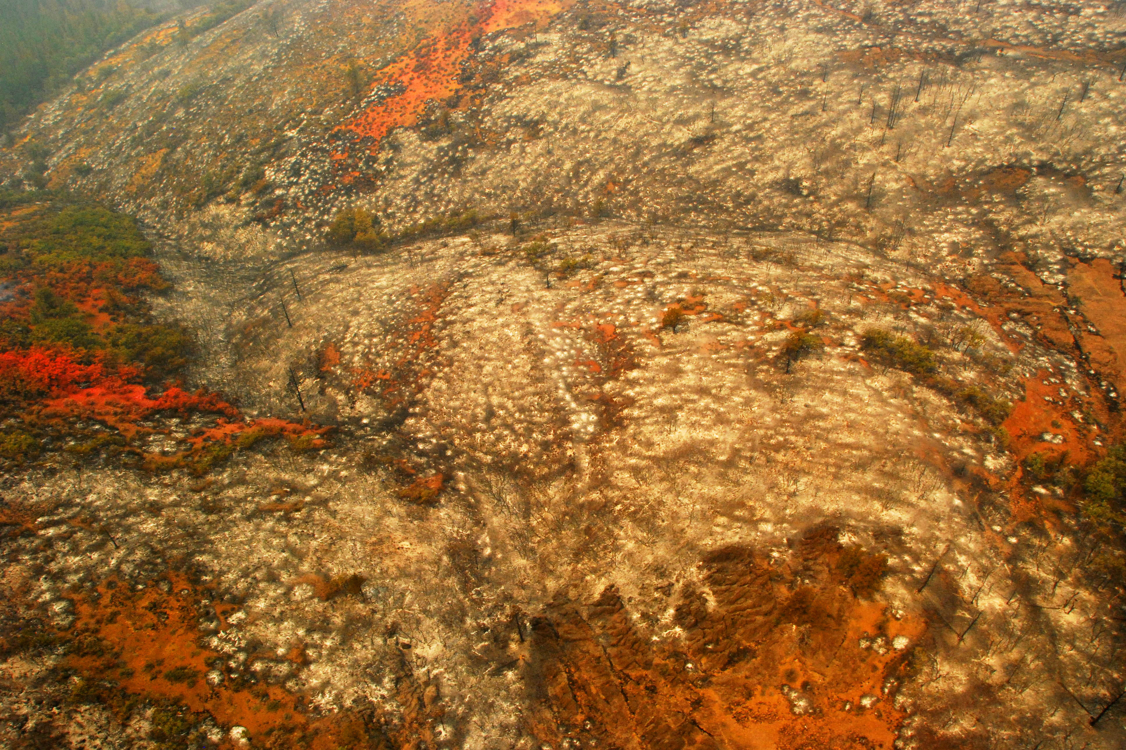 An aerial view shows acres of ground scorched by the Day Fire near An aerial view shows acres of ground scorched by the Day Fire near