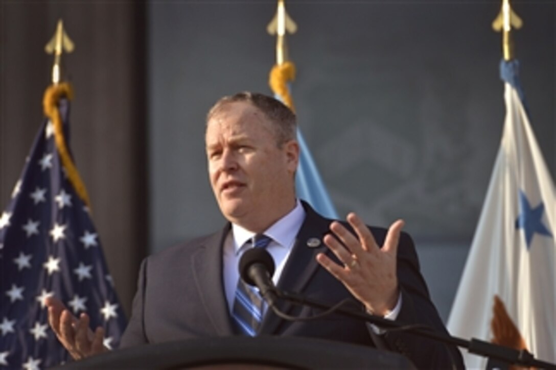 Deputy Defense Secretary Bob Work delivers remarks at the convocation ceremony for the National Defense University on Fort McNair in Washington, D.C., Aug. 5, 2014. (Released)