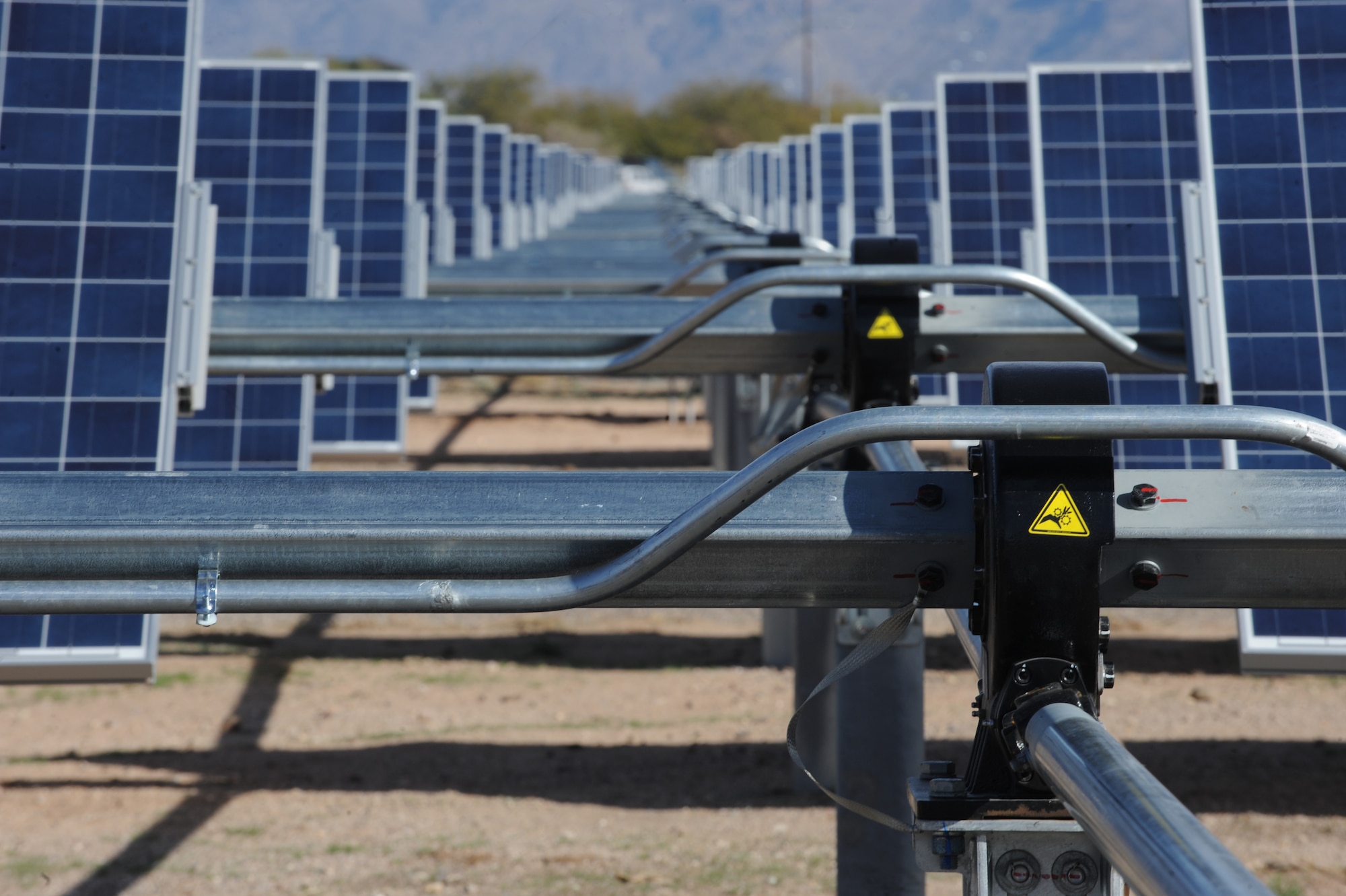 Solar panels collect sunlight at Davis-Monthan Air Force Base, Ariz. The Davis-Monthan solar array project is placed on 170 acres of underutilized land, making it the largest of its kind currently on any U.S Department of Defense installation. The Department of Energy chose it as a 2014 Federal Energy Management Program award winner. (U.S. Air Force photo)