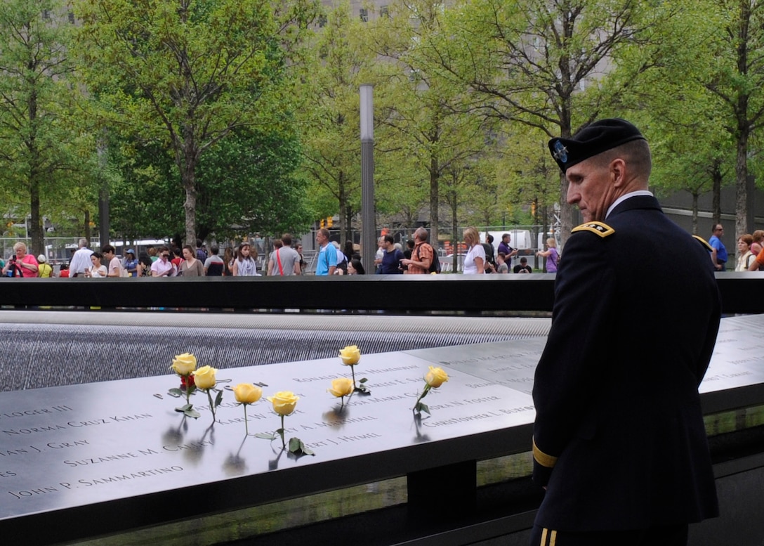 At the 9/11 Memorial in New York, DIA Director Army Lt. Gen. Michael Flynn pays tribute to the seven agency employees lost during the Sept. 11 attack on the Pentagon: Rosa Chapa, Sandra Foster, Robert Hymel, Shelley Marshall, Patricia Mickley, Charles Sabin and Karl Teepe. 