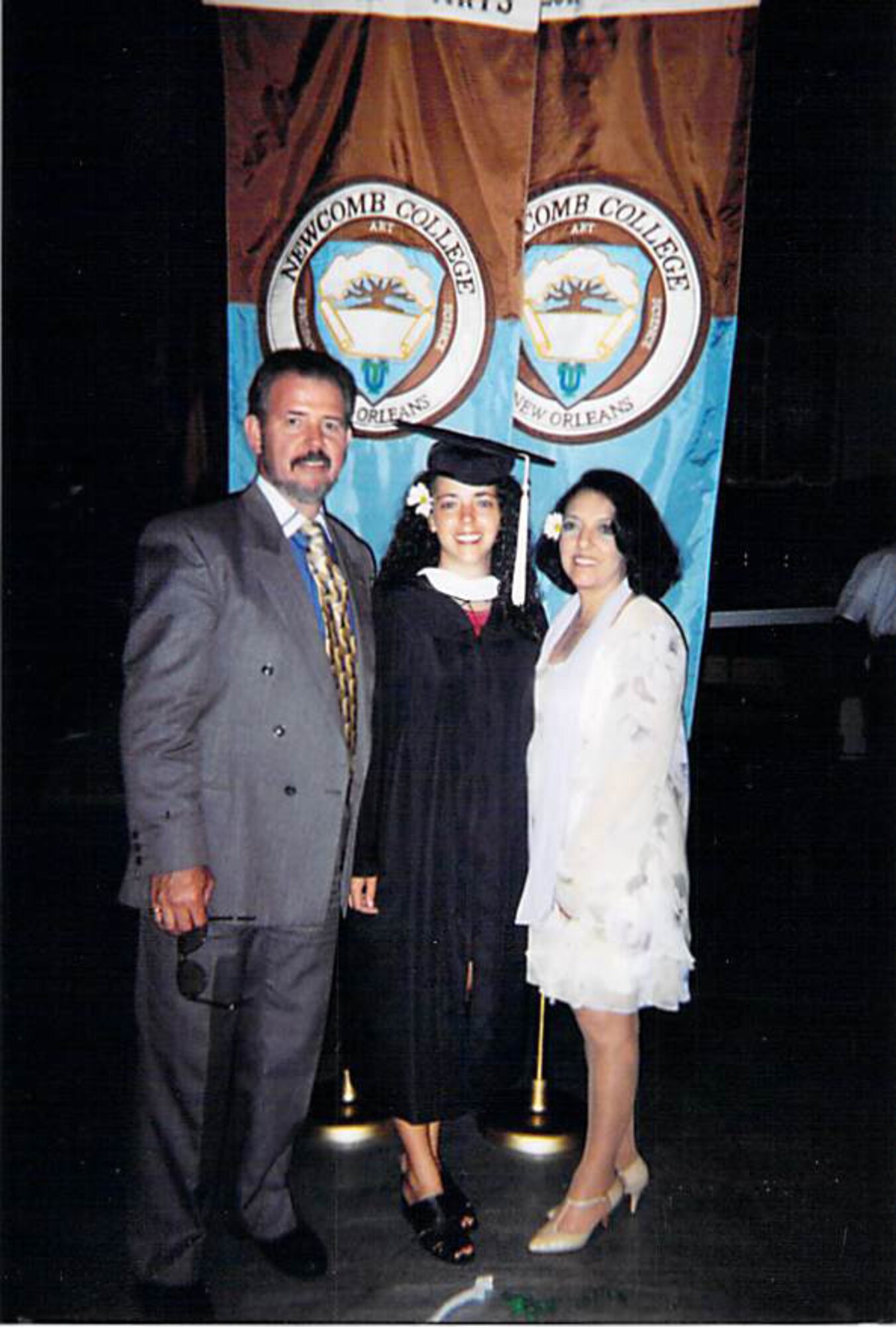 Maj. Liliana Henriquez (center) stands with her father, Roberto Henriquez, and mother, Liliana Henriquez, after graduating from Newcomb College in New Orleans. Maj. Henriquez, Oceana Dam Neck Annex Joint Targeting School joint staff J7 instructor, graduated in 1998. (Courtesy photo)